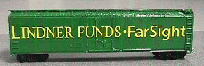 Green boxcar with co-branded Lindner-FarSight logo in yellow